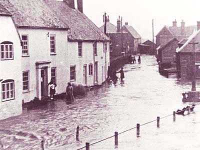 Barnards and War Memorial flooded, Hazel Goddard on doorstep