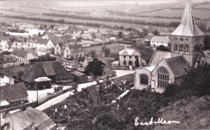 The rifle range is the long, light roof at the top left of this postcard.