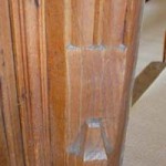 Elaborate Carving at the foot of the door frame of the Sitting Room